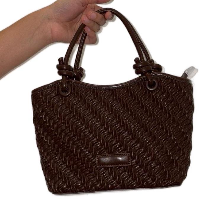 Interwoven Hand Bag - Fashion Accessory for Your Collection